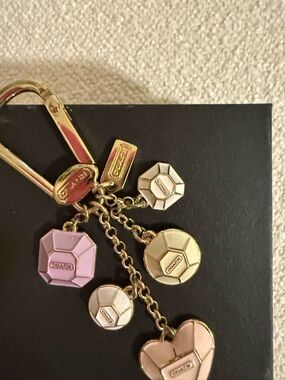 Coach Gold-tone Keychain with Pink Heart Charms